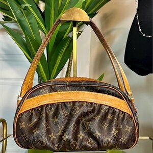 AUTHENTICATED!  Louis Vuitton Monogram Canvas Tivoli PM Handbag With Double Hand
